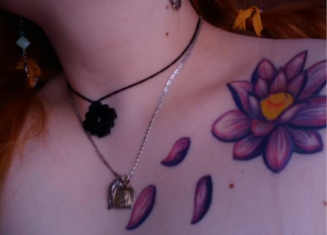 Attractive Lotus Flower Tattoo On Collarbone