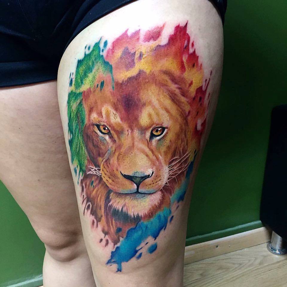 Beautiful Colored Lion Head Tattoo On Left Thigh by Kory Angarita