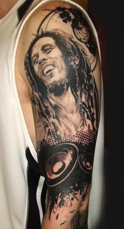 Black And Grey Bob Marley Tattoo On Left Sleeve