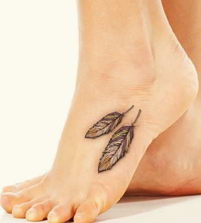 Black And Grey Feather Tattoo On Left Foot