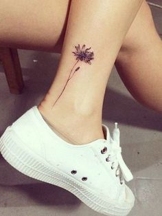 Black And Grey Flower Tattoo On Right Ankle