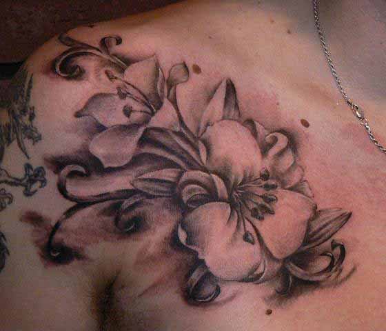 Black And Grey Flowers Tattoo On Collar Bone