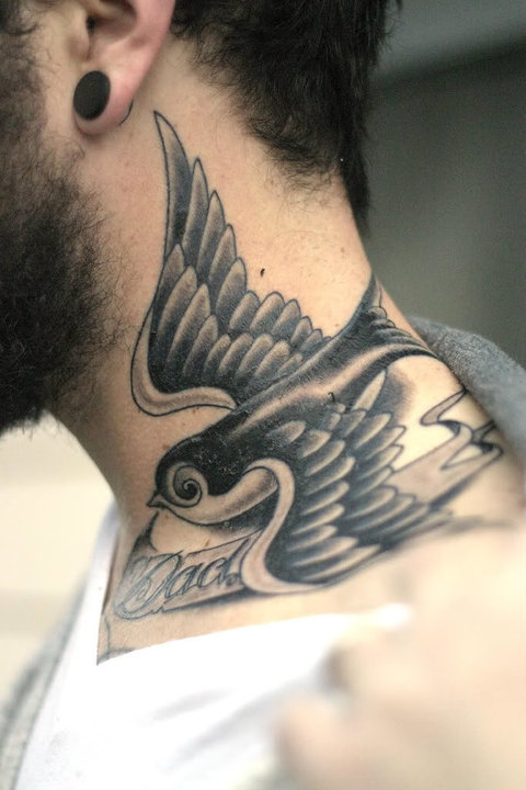 Black And Grey Flying Bird With Banner Tattoo On Man Side Neck