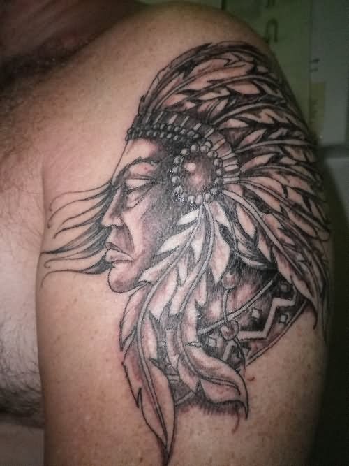 Black And Grey Native Indian Face Tattoo On Left Shoulder