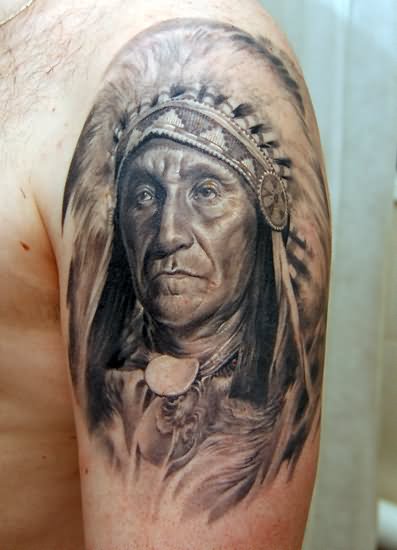 Black And Grey Native Indian Tattoo On Left Shoulder