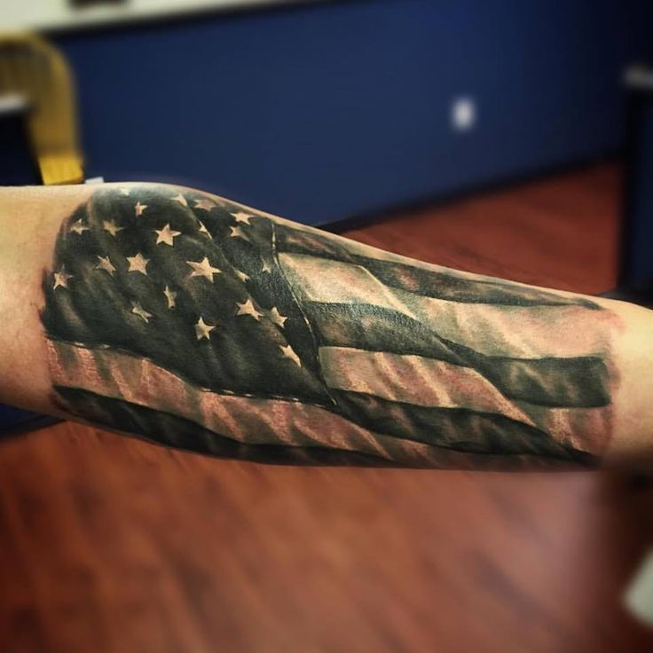 Black And Grey USA Flag Tattoo On Left Forearm