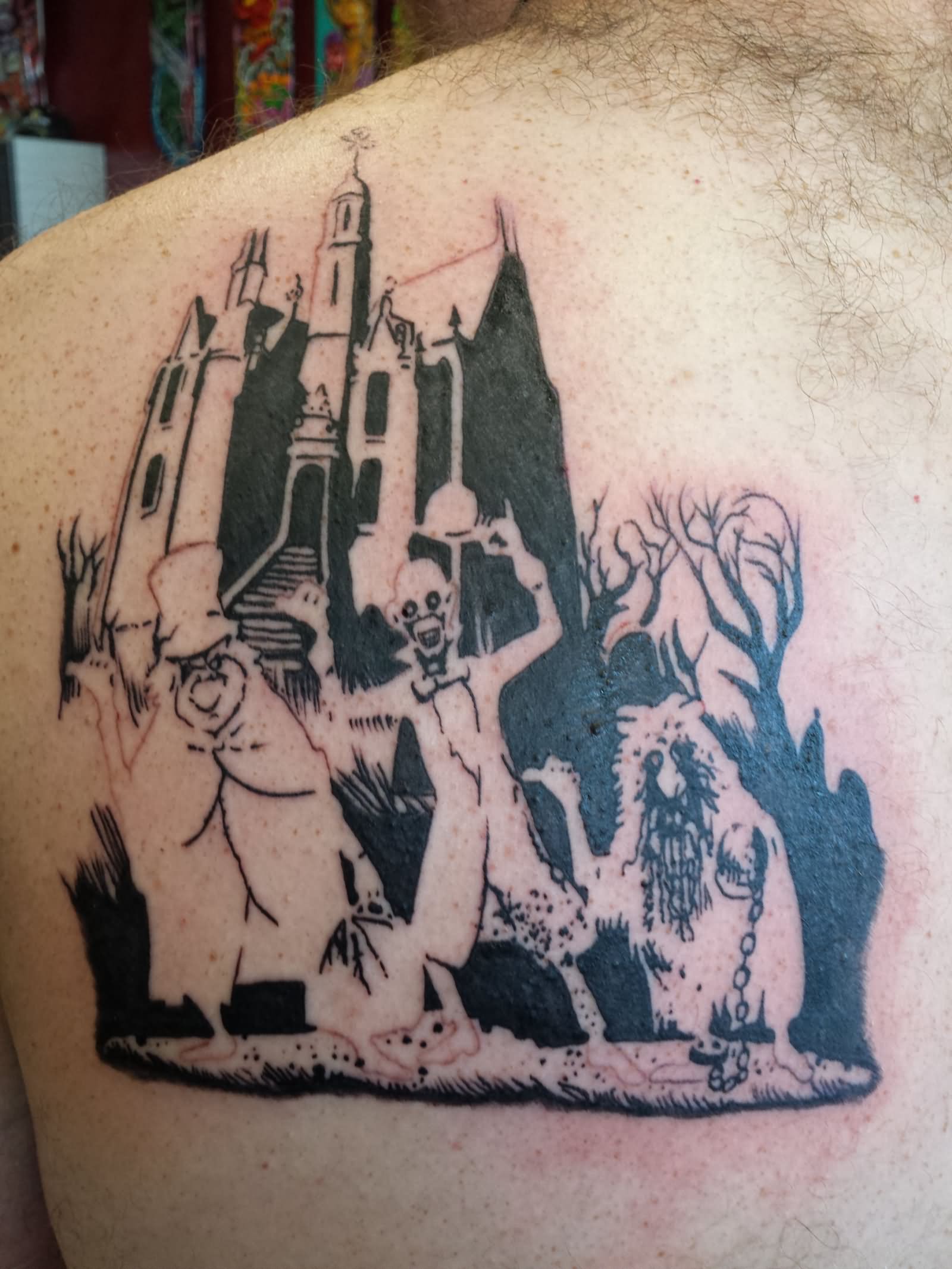 Black And White Haunted House Tattoo On Back