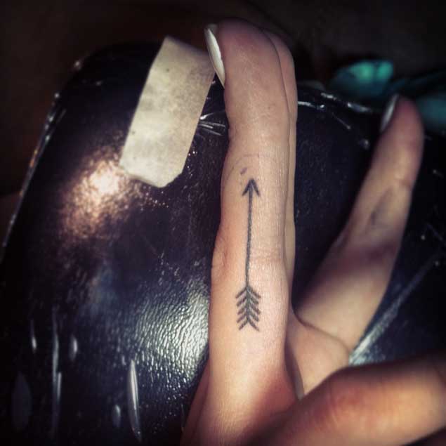 Black Arrow Tattoo On Finger
