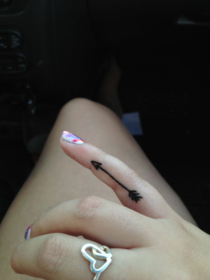 Black Arrow Tattoo On Girl Side Finger