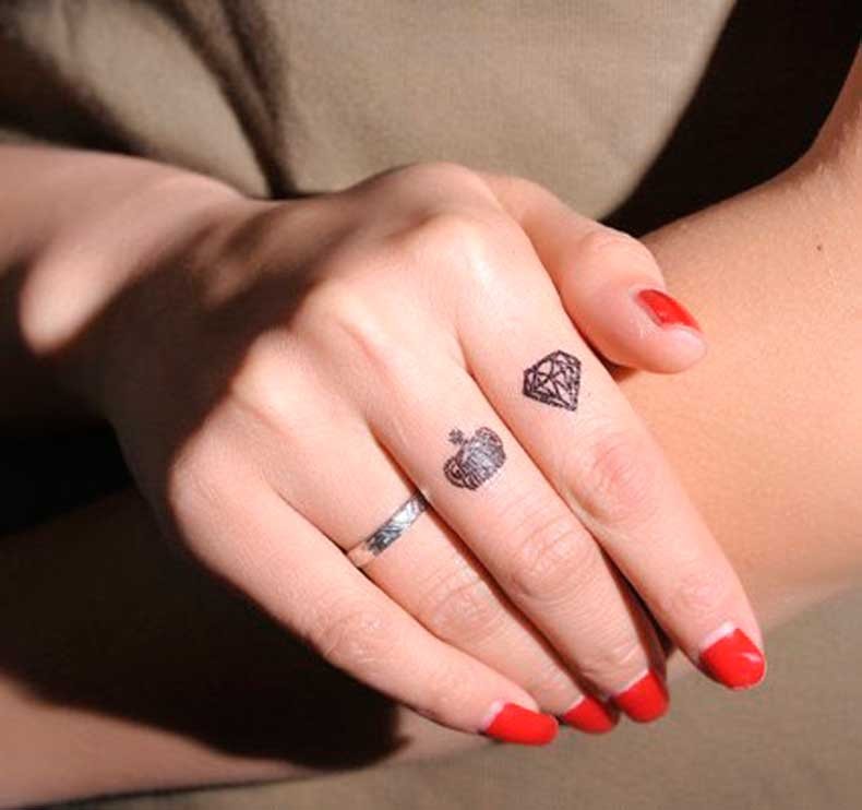 Black Crown And Diamond Tattoo On Girl Fingers