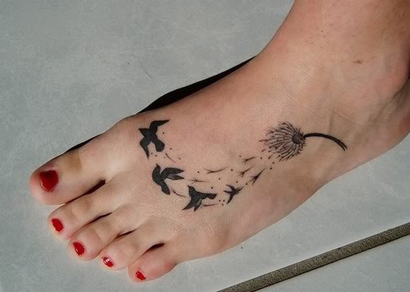 Black Dandelion With Flying Birds Tattoo On Girl Left Foot