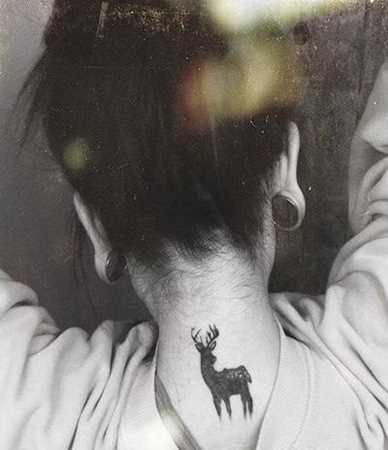 Black Deer Tattoo On Girl Back Neck