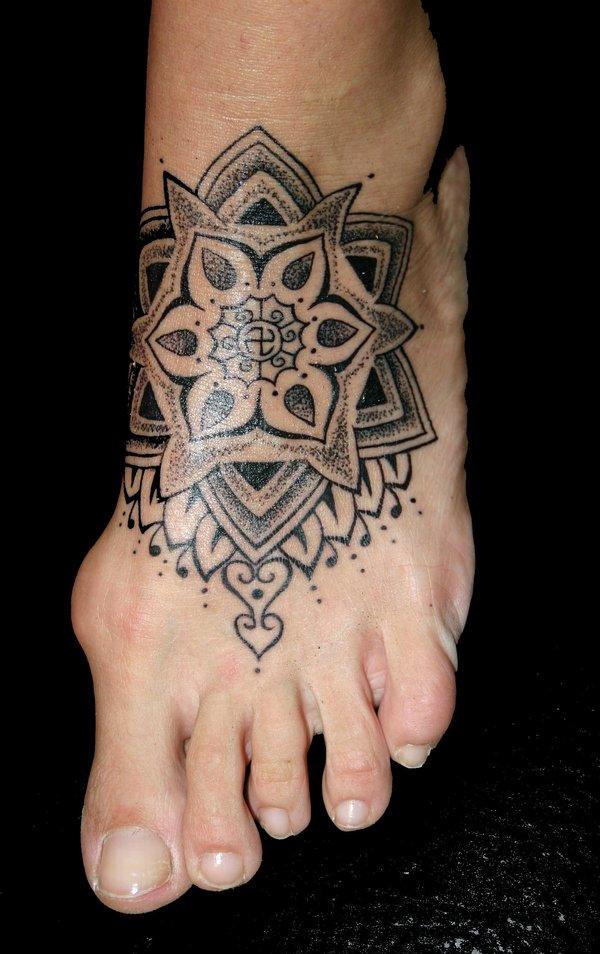 Black Dotwork Flower Tattoo On Left Foot By Petra Burck