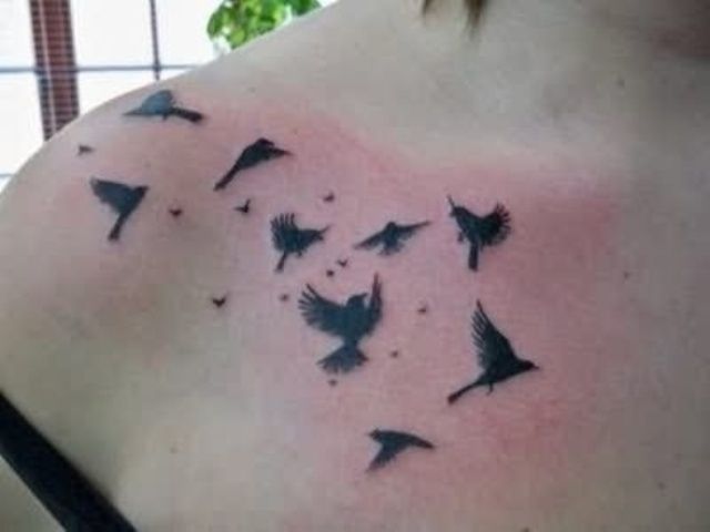Black Flying Birds Tattoo On Collar Bone