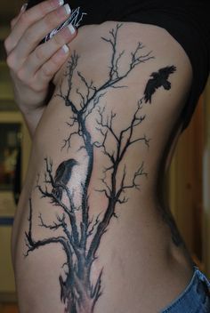 Black Gothic Tree With Flying Crows Tattoo On Girl Side Rib