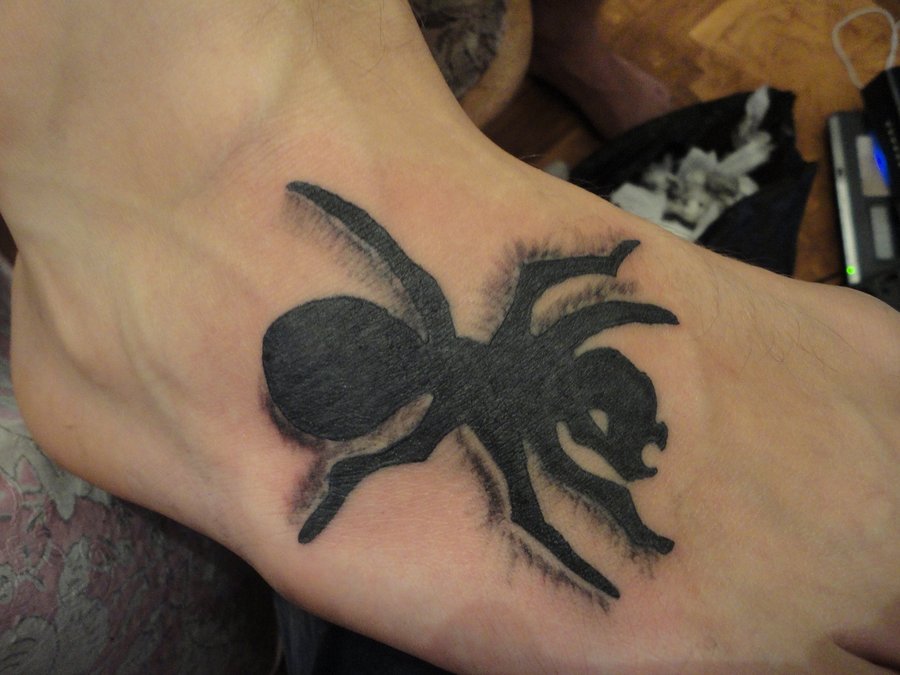 Black Ink Ant Tattoo On Right Foot