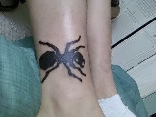 Black Ink Ant Tattoo On Right Leg