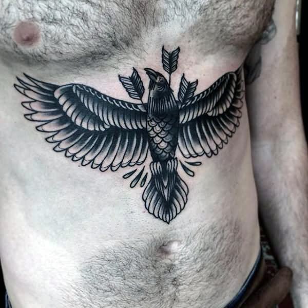 Black Ink Arrows In Eagle Tattoo On Man Stomach