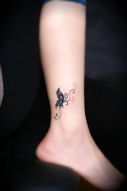 Black Ink Butterfly Tattoo On Ankle
