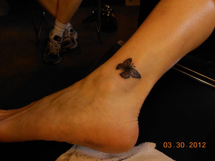 Black Ink Butterfly Tattoo On Girl Ankle