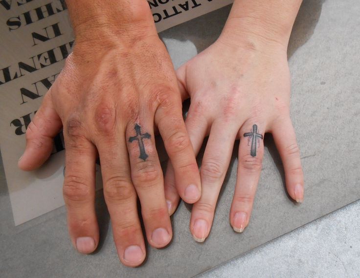 Black Ink Cross Ring Tattoo On Couple Finger