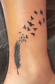 Black Ink Feather With Flying Birds Tattoo On Ankle