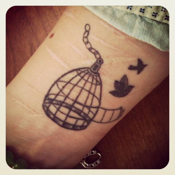 Black Ink Flying Birds Cage Tattoo
