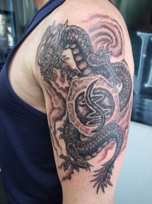 Black Ink Gothic Dragon Tattoo On Man Left Half Sleeve
