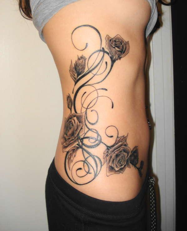 Black Ink Gothic Roses Tattoo On Girl Right Side Rib