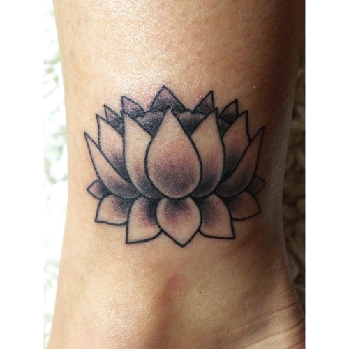 Black Ink Lotus Flower Tattoo Design For Inner Ankle