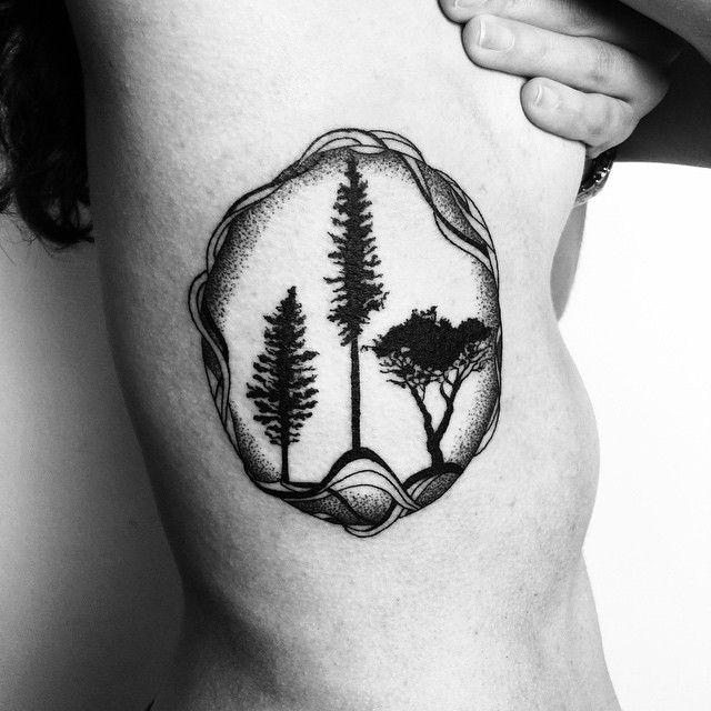 Black Ink Nature Trees In Frame Tattoo On Right Side Rib