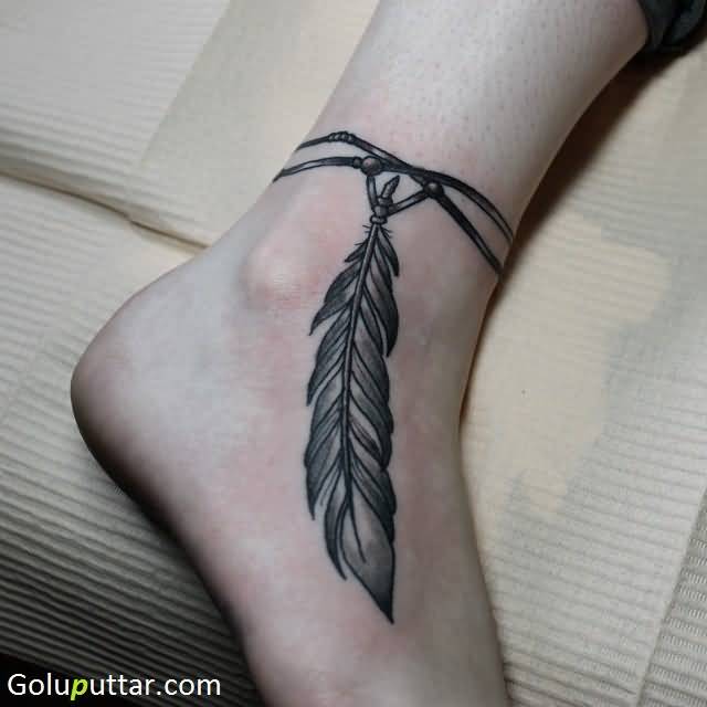 Black Ink Rosary Feather Tattoo On Ankle