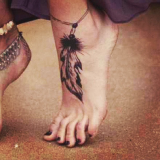 Black Ink Rosary Feather Tattoo On Girl Ankle