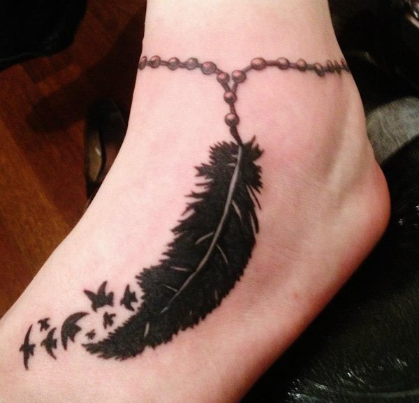 Black Ink Rosary Feather With Flying Birds Tattoo On Foot