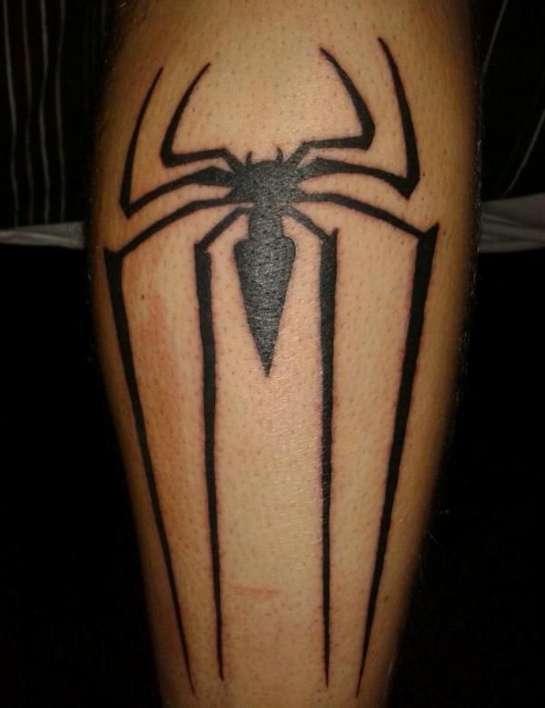 Black Ink Spider Logo Tattoo On Back Leg