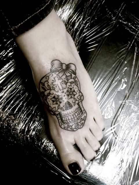 Black Ink Sugar Skull Tattoo On Girl Left Foot
