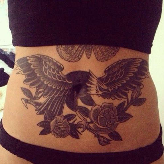 Black Ink Traditional Eagle With Roses Tattoo On Girl Stomach