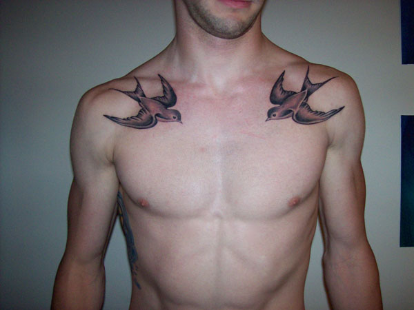 Black Ink Two Flying Birds Tattoo On Man Collar Bone