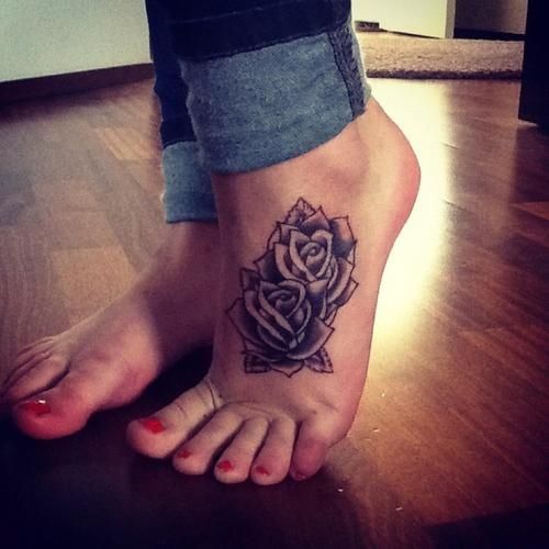 Black Ink Two Rose Tattoo On Girl Left Foot
