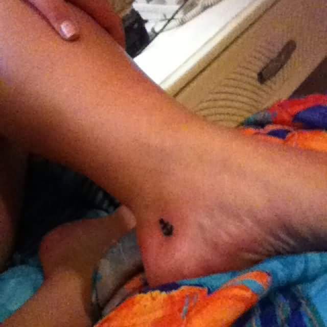 Black Little Anchor Tattoo On Inner Ankle