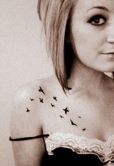 Black Little Flying Birds Tattoo On Girl Left Collar Bone