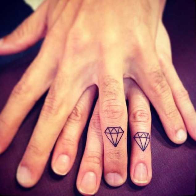 Black Outline Diamond Tattoo On Couple Finger