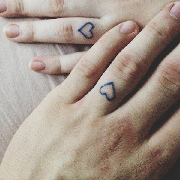 Black Outline Heart Tattoo On Couple Finger