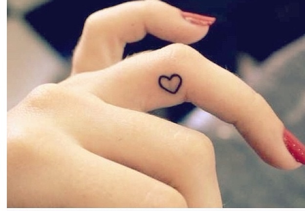 Black Outline Heart Tattoo On Girl Inner Finger