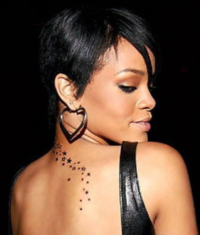 Black Stars Tattoo On Rihanna Back Neck