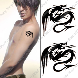 Black Tribal Gothic Dragon Tattoo On Man Left Shoulder
