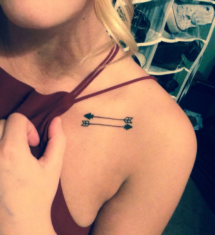 Black Two Arrow Tattoo On Girl Collar Bone
