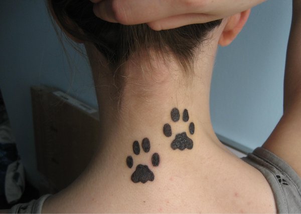 Black Two Paw Print Tattoo On Girl Back Neck