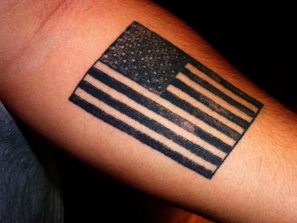 Black USA Flag Tattoo On Left Forearm