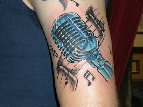 Blue Mic And Music Notes Tattoo On Bicep